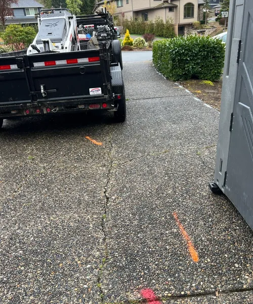 Broom Finish Driveway With Decorative Borders in Edmonds 